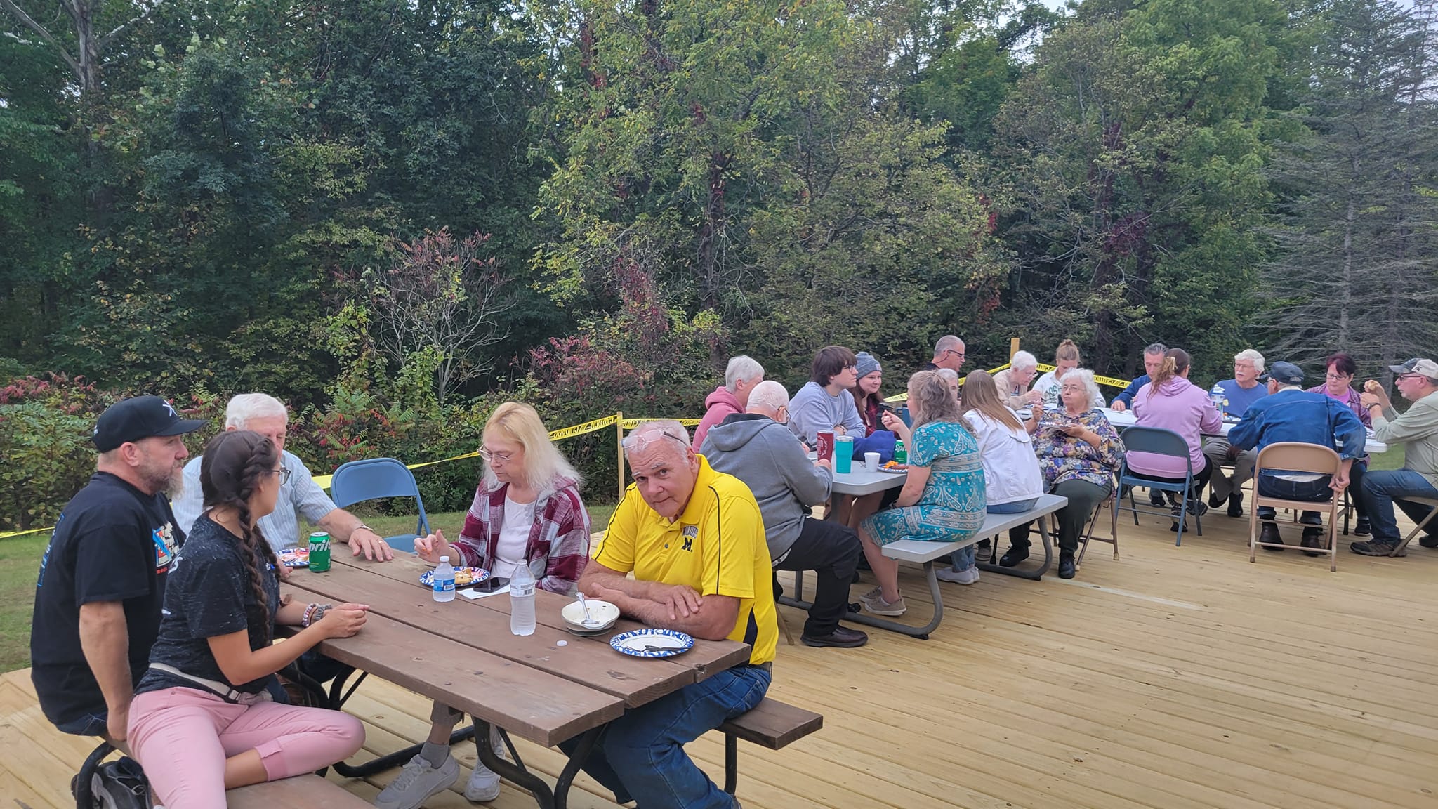Church members enjoying an outdoor picnic gathering
