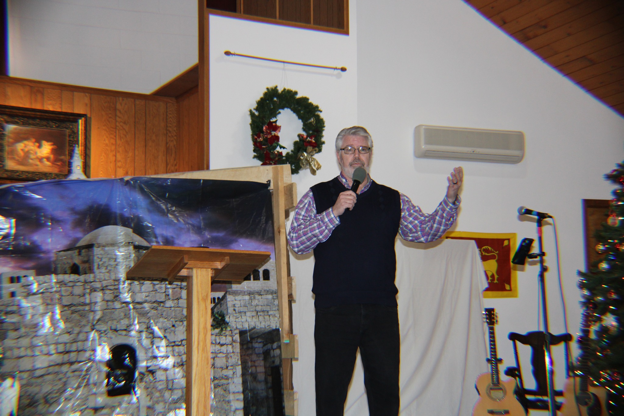 Pastor Jon R. Wallace speaking at a church service